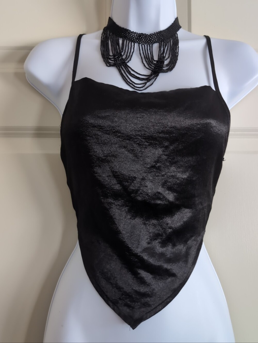 Black satin triangle hem spaghetti strap tank top with lace up back
